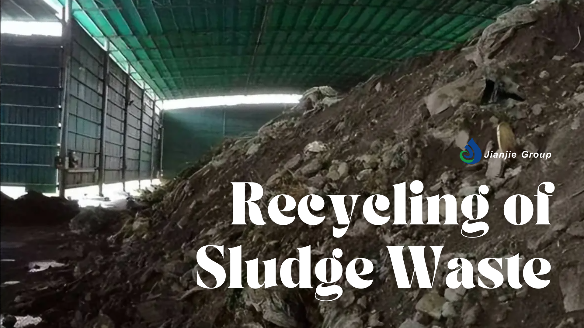 Image showing a large pile of sludge waste under a green-roofed structure, with the text "Recycling of Sludge Waste" and the Jianjie Group logo.